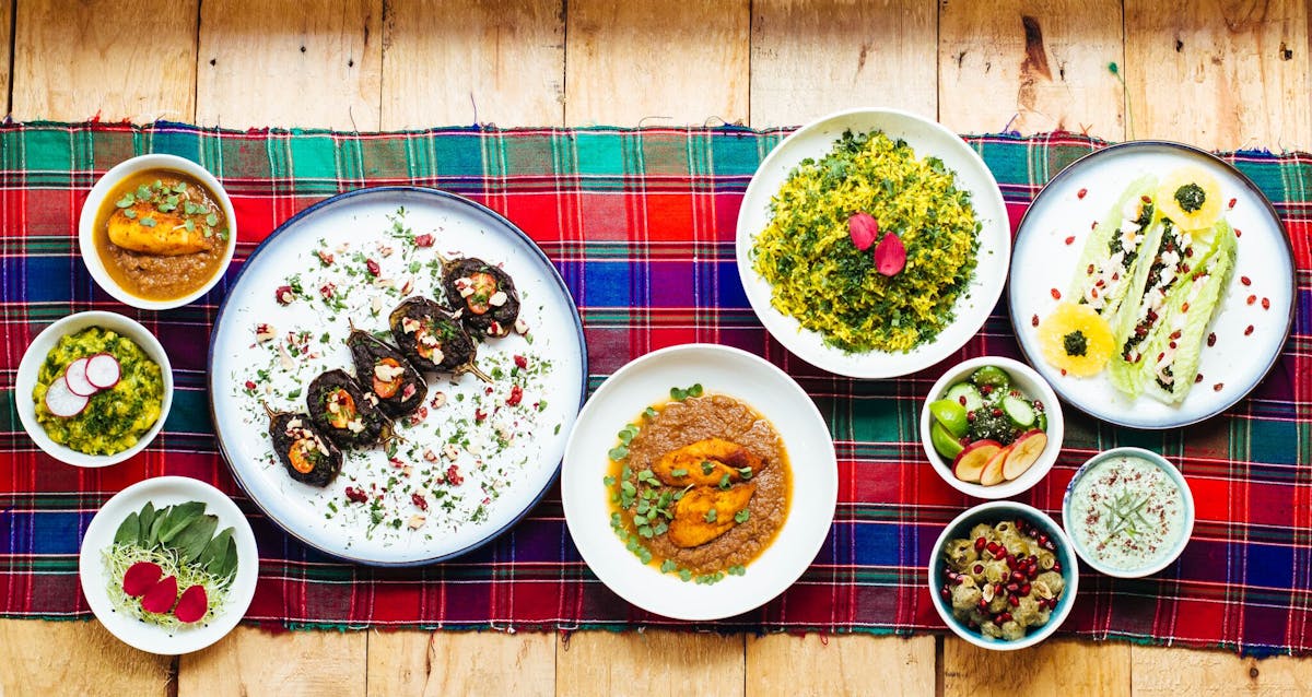 a bowl of food on a plate on a table