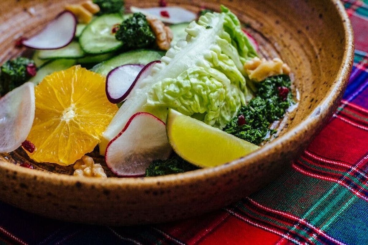 a close up of a bowl of fruit