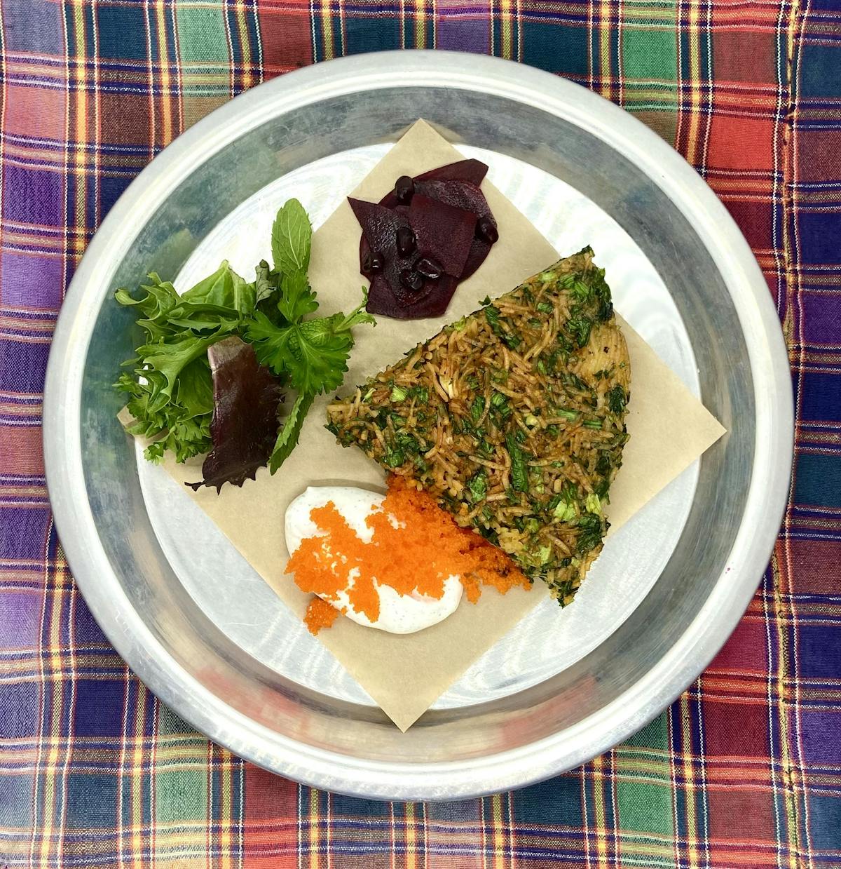 a plate of food with broccoli