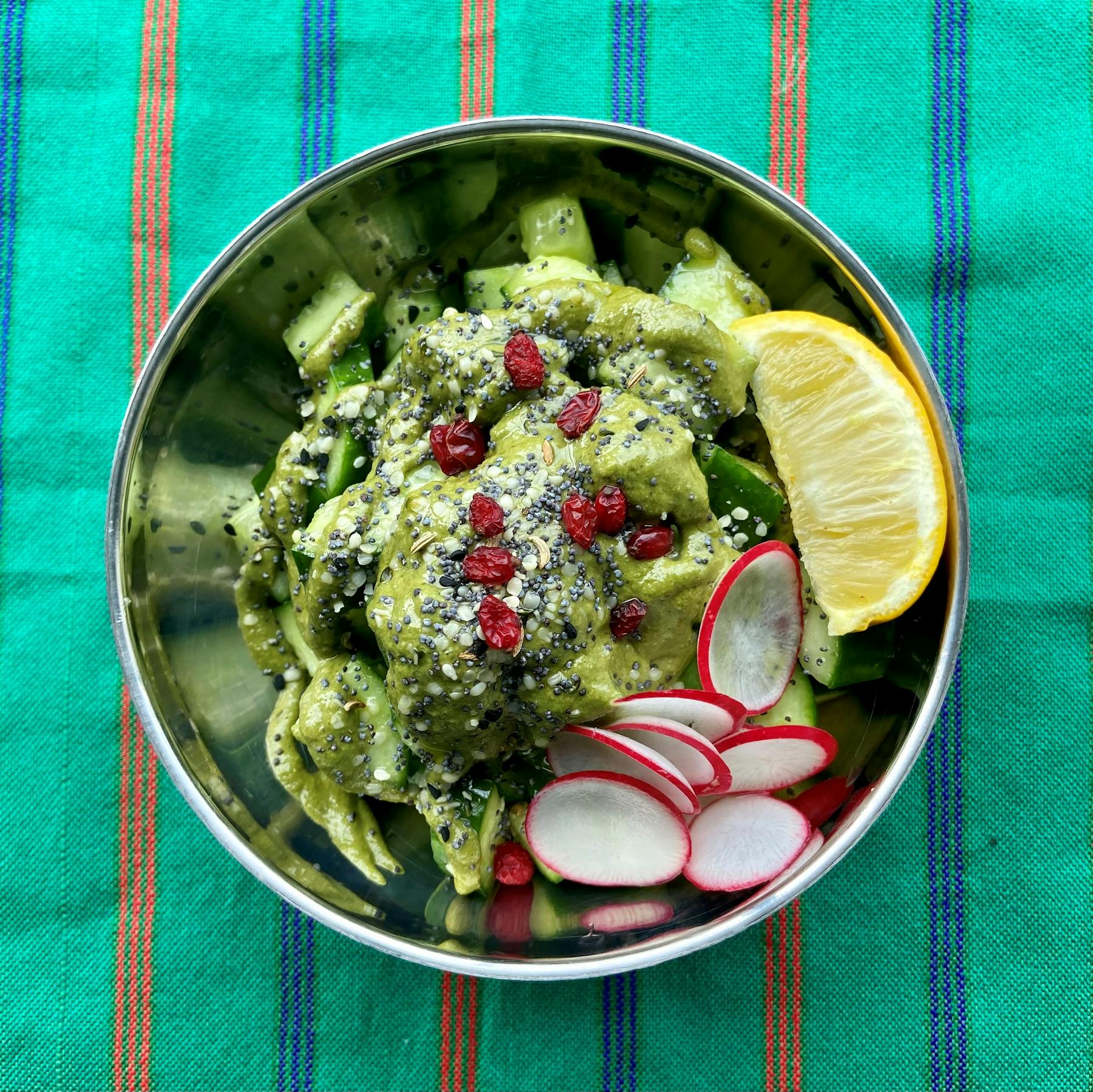 a bowl of salad on a plate