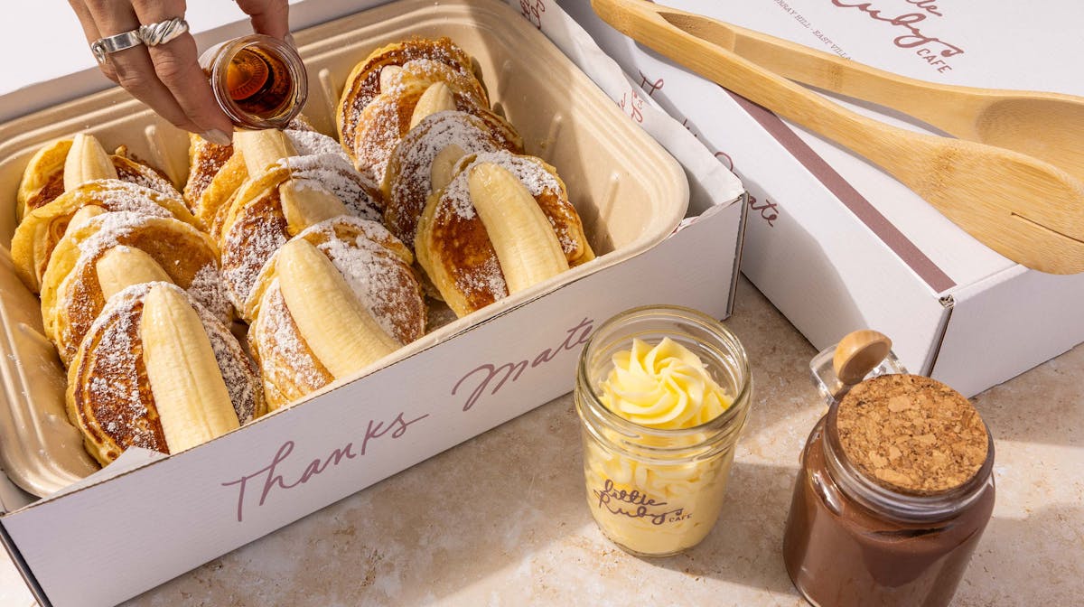 a box filled with different types of food on a table