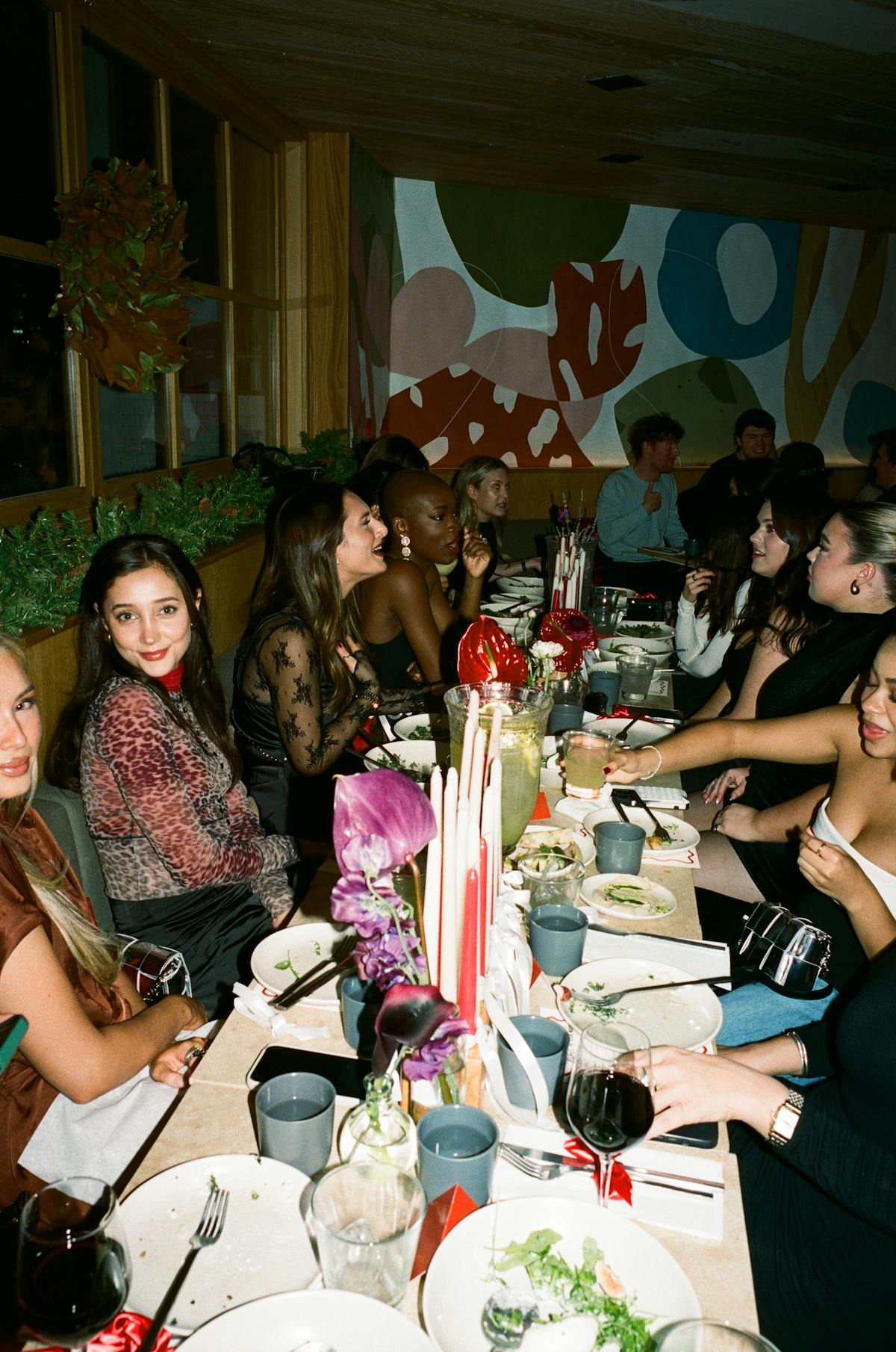 a group of people sitting at a table