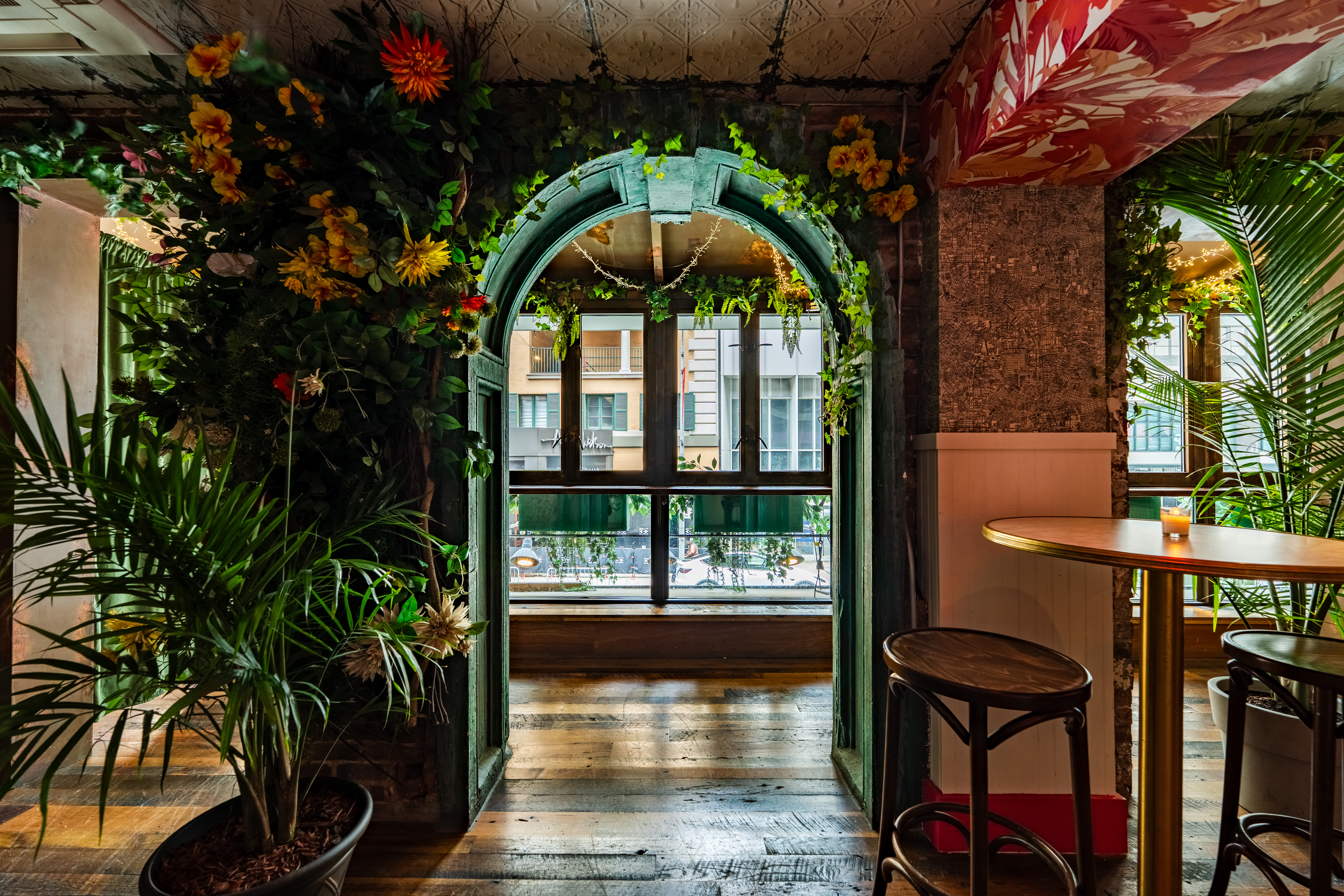 a dining room table in front of a window
