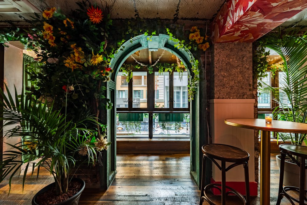 a dining room table in front of a window