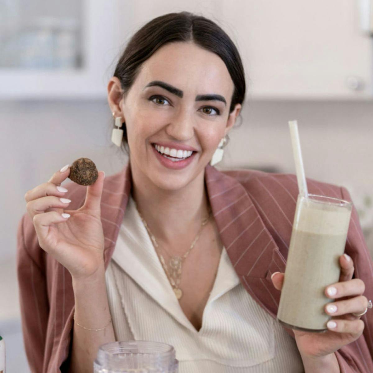 a woman holding a wine glass