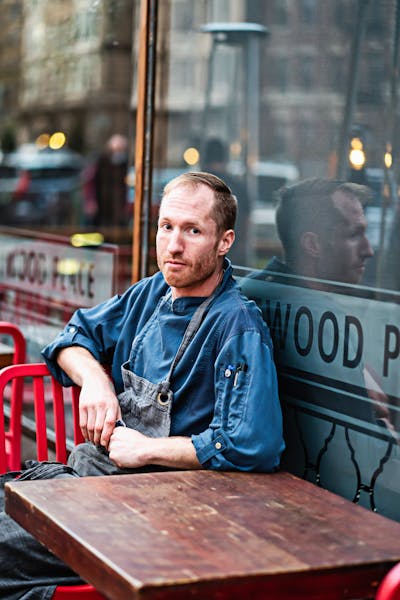 a man sitting on a bench