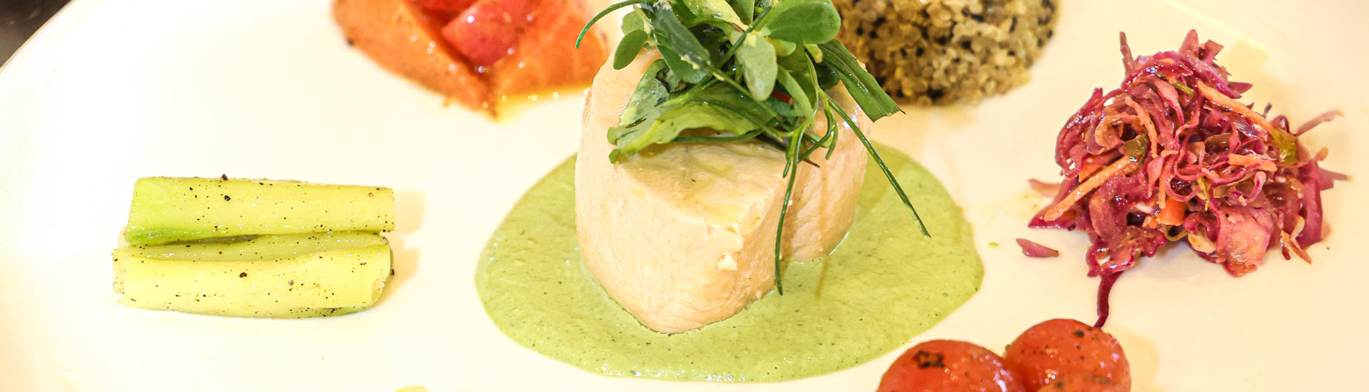 Image of colorful mezze dish featuring cold poached salmon at The Bocuse Restaurant on CIA’s campus in Hyde Park, NY.
