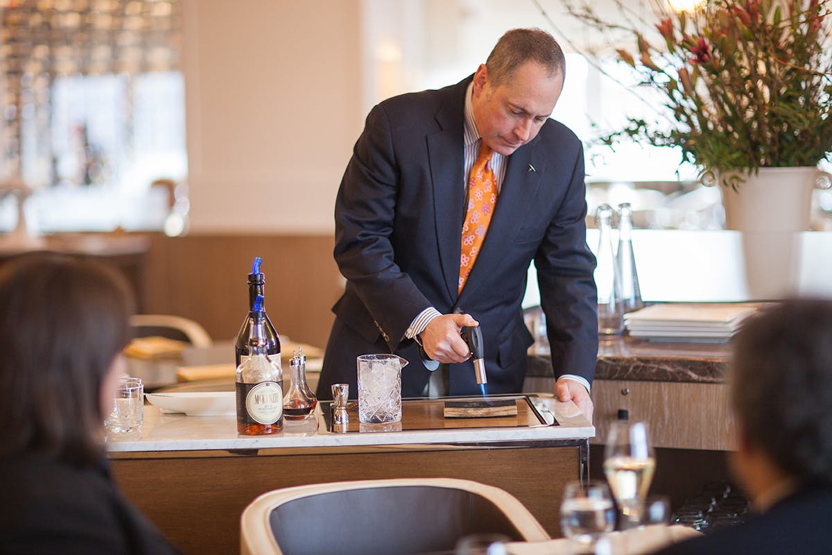 Tableside cart service, mixing cocktails at The Bocuse Restaurant at the CIA in Hyde Park, NY.