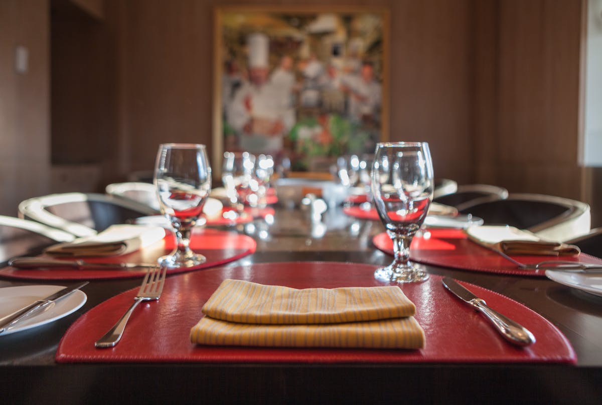 Table set in the private dining room at Bocuse Restaurant at The Culinary Institute of America in NY.
