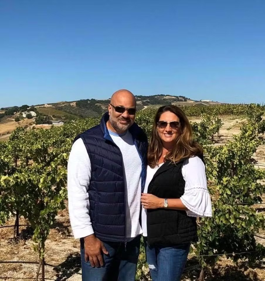 a couple in a vineyards