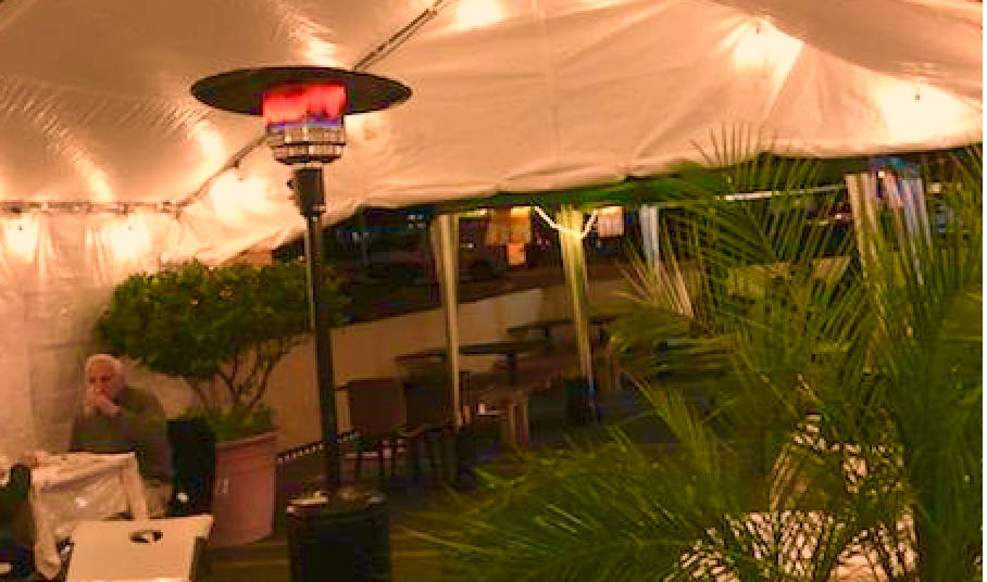 an umbrella sitting on top of a table