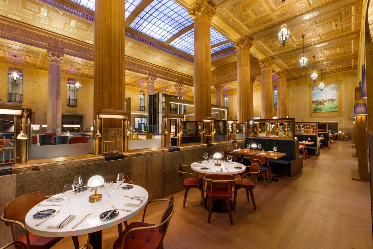 a large room with tables and chairs