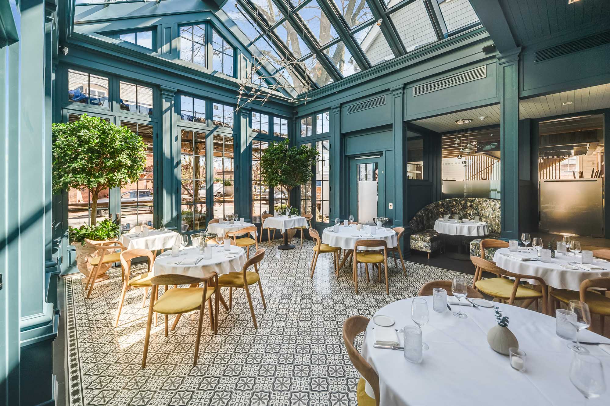 a dining room table in front of a building
