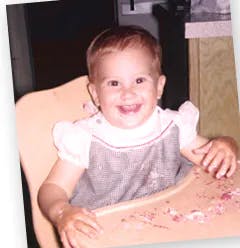 a baby sitting on a table