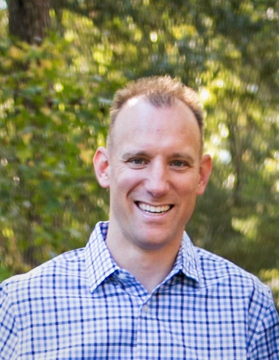 a man smiling for the camera