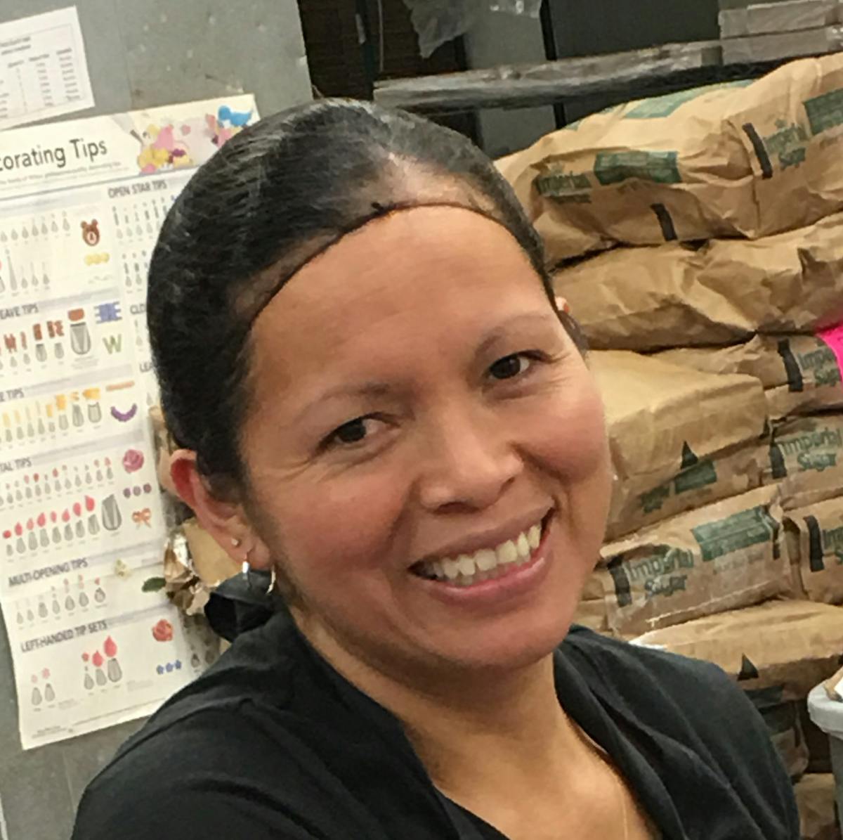 a woman smiling for the camera