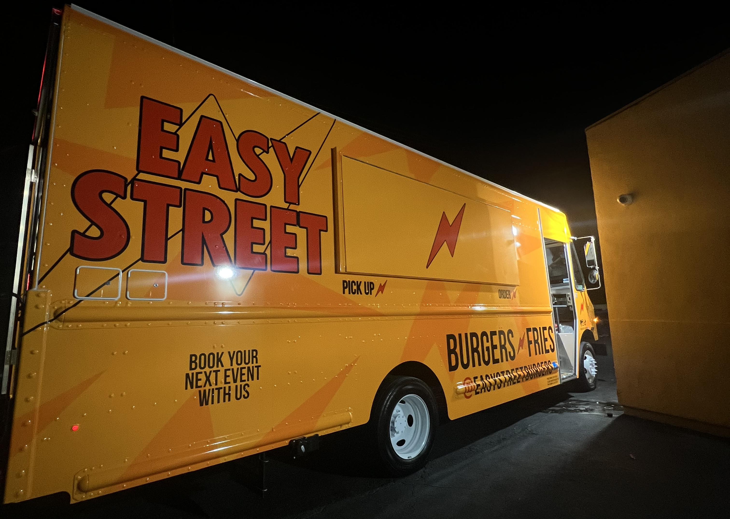 a box truck is parked in a parking lot