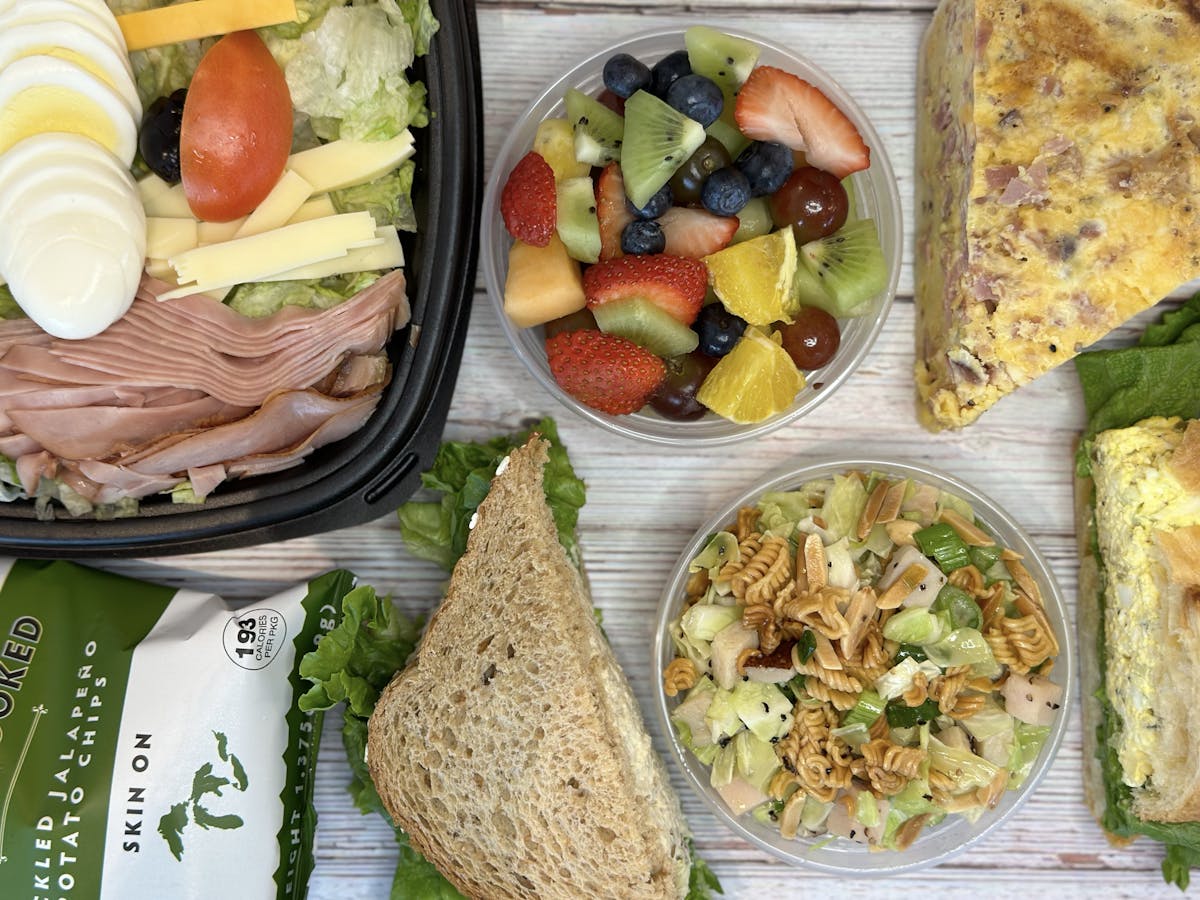 a box filled with different types of food on a table