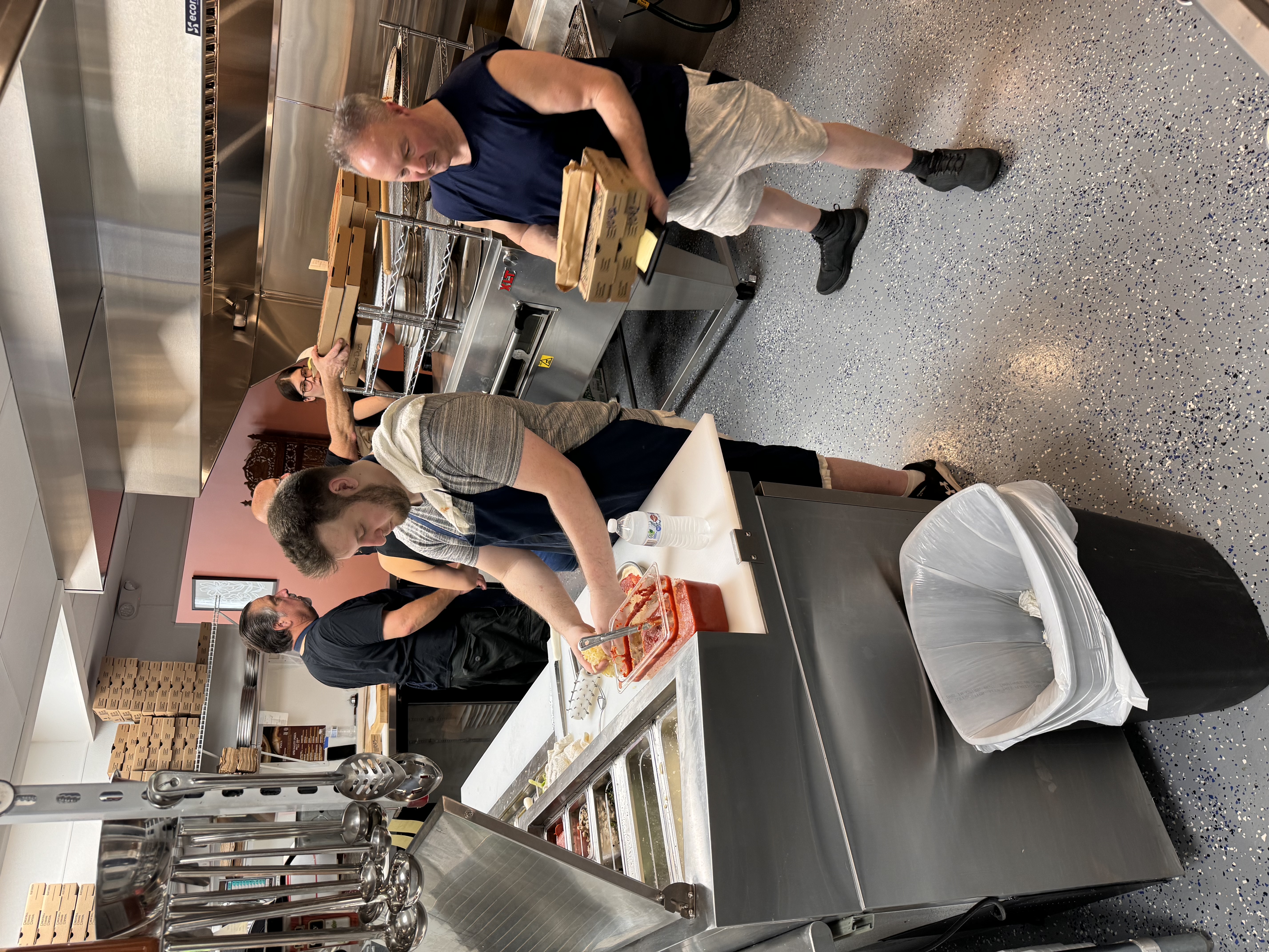 a group of people performing on a counter