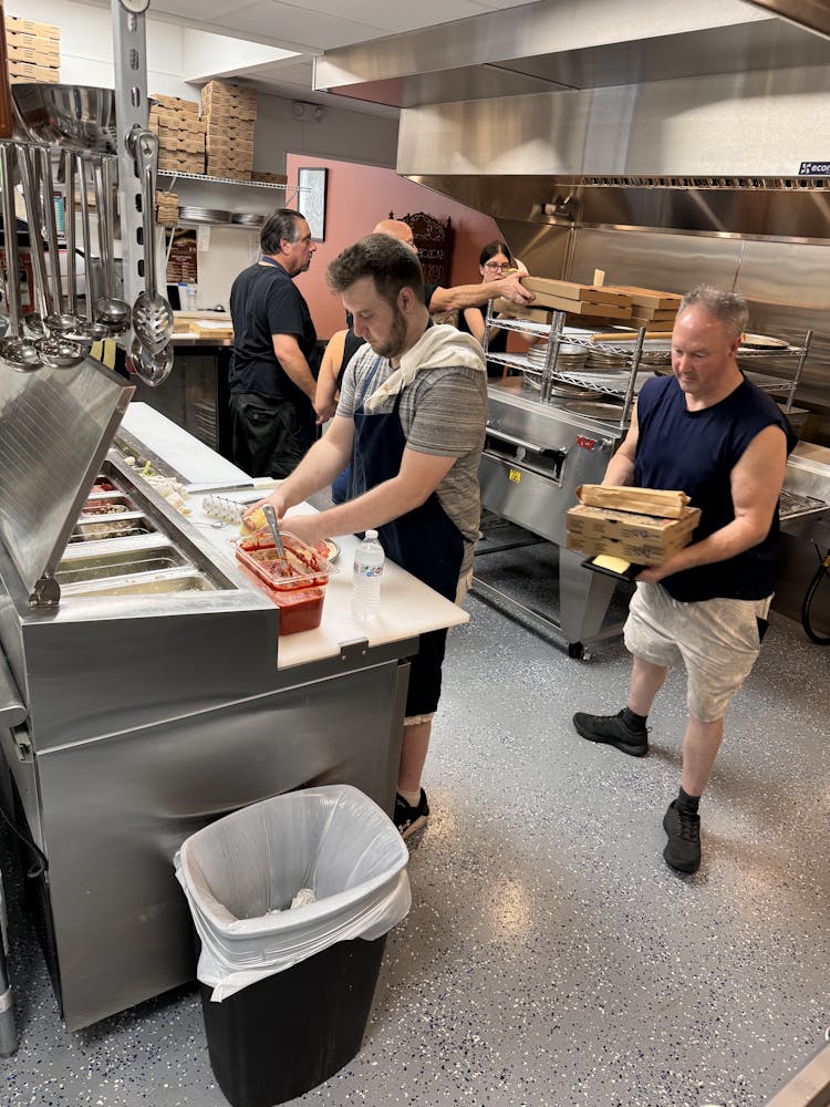 a group of people performing on a counter