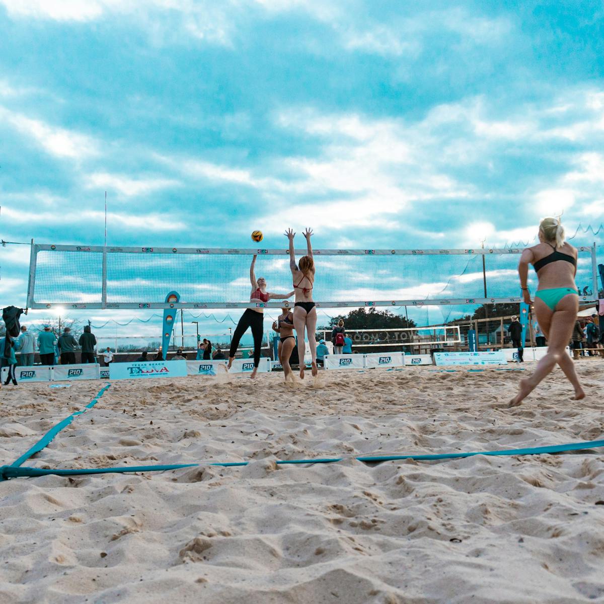 a group of people on a beach