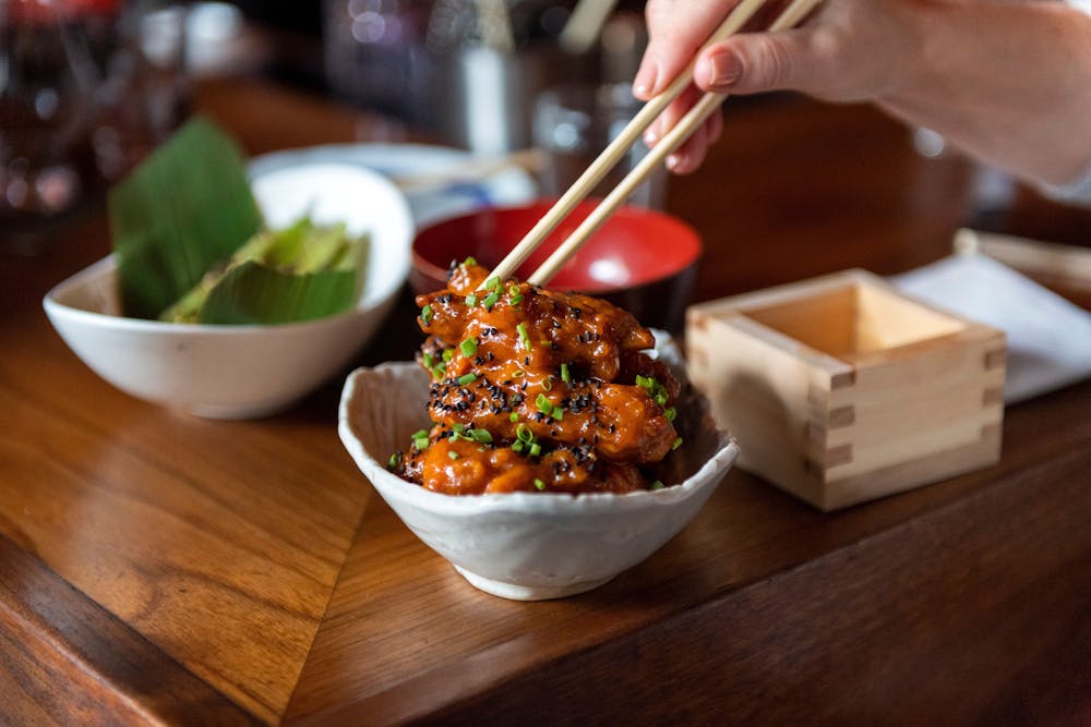 a group of people sitting at a table