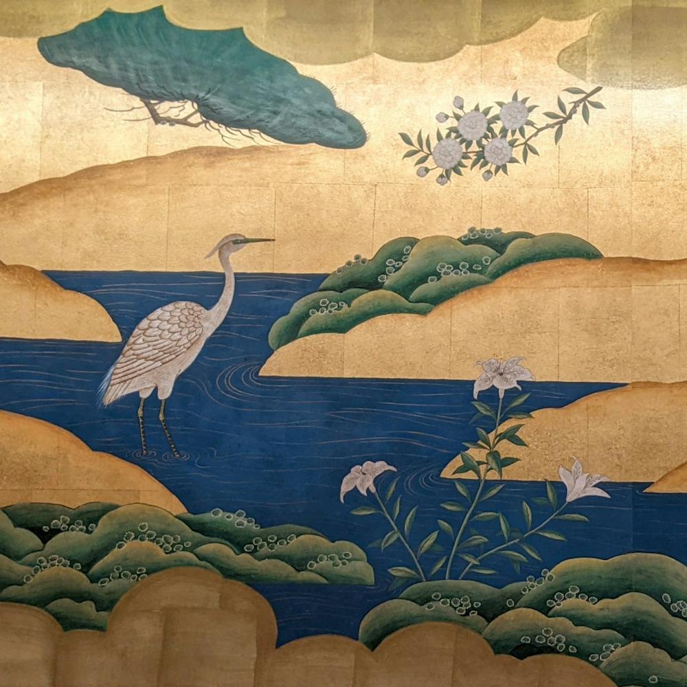 a flock of birds sitting on a couch