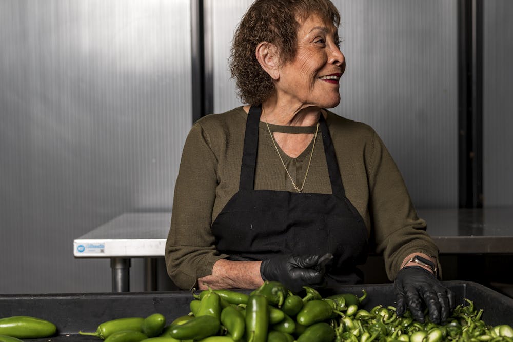 a man sitting in front of a window
