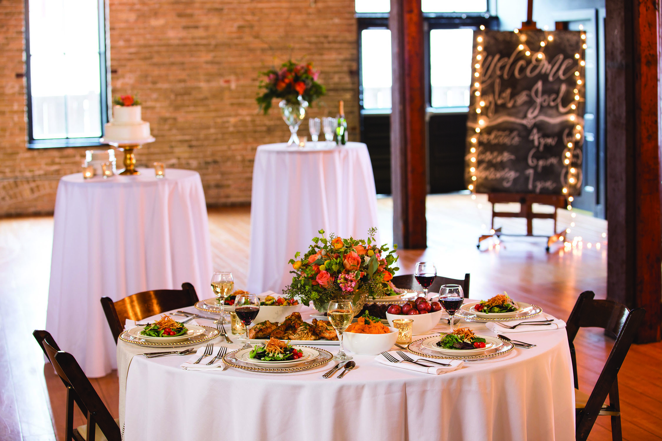 a dining table with a cake on a plate