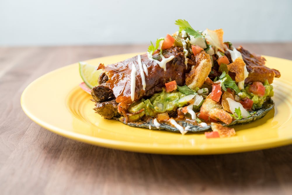 a blue tortilla taco on a plate