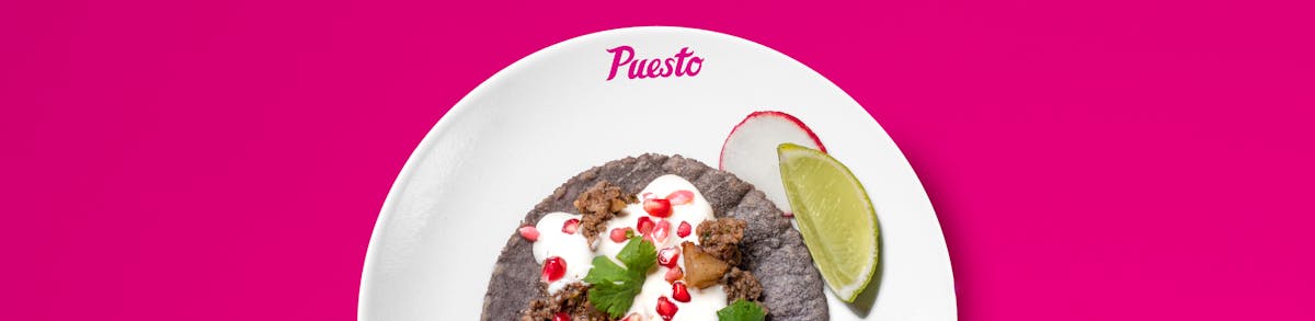 a blue tortilla taco on a plate