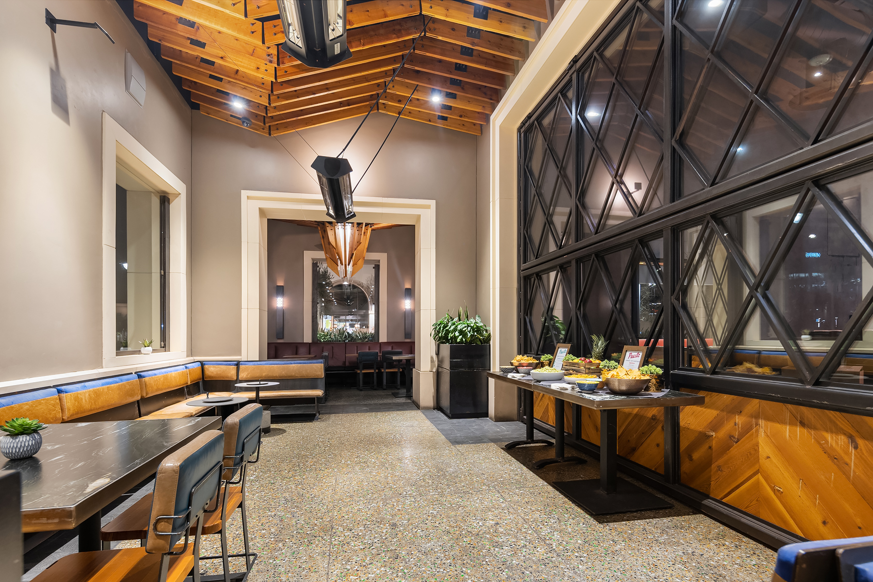 a room filled with furniture and a large window