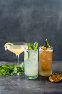 a close up of three drinks on a table