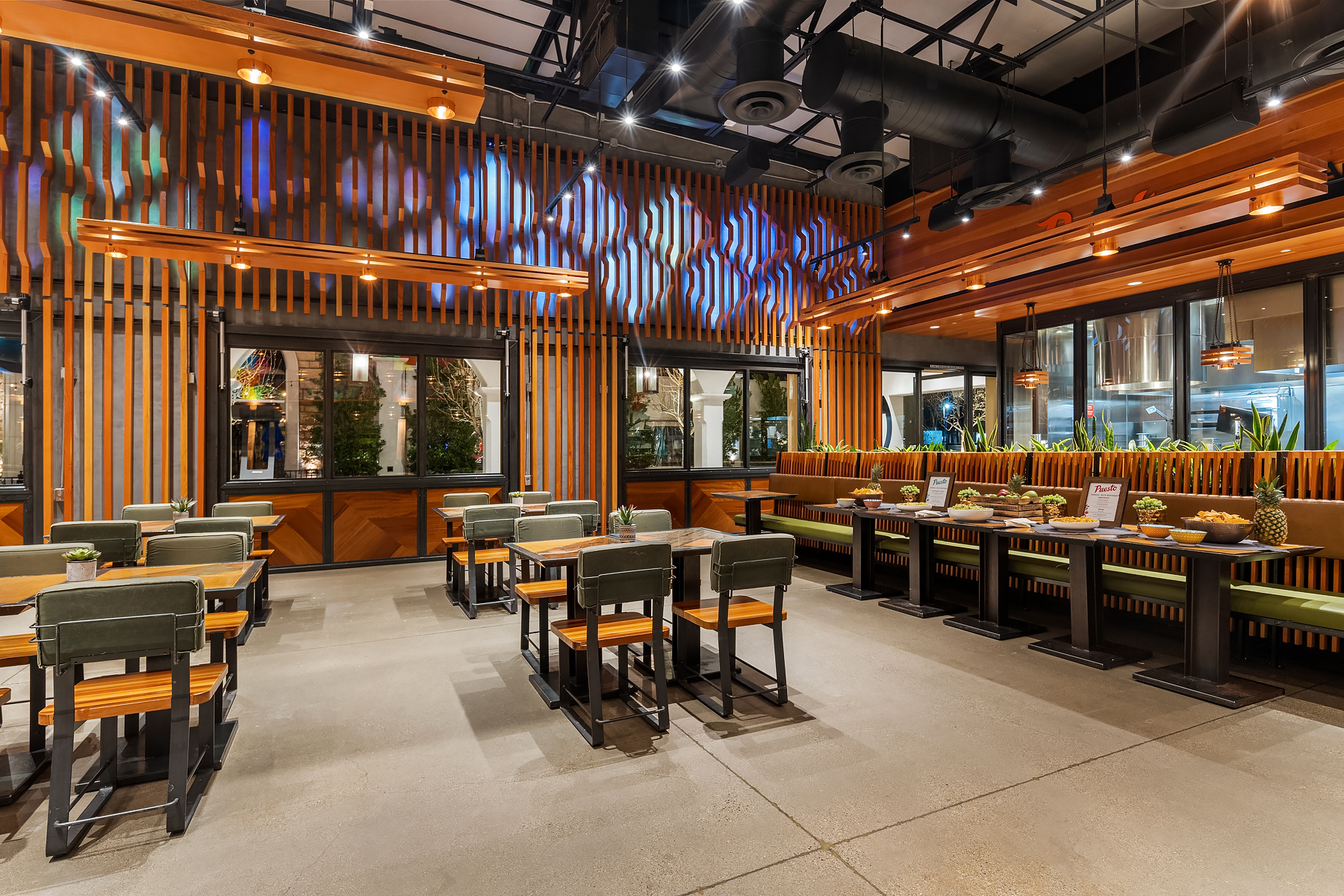 a group of people sitting at a train station