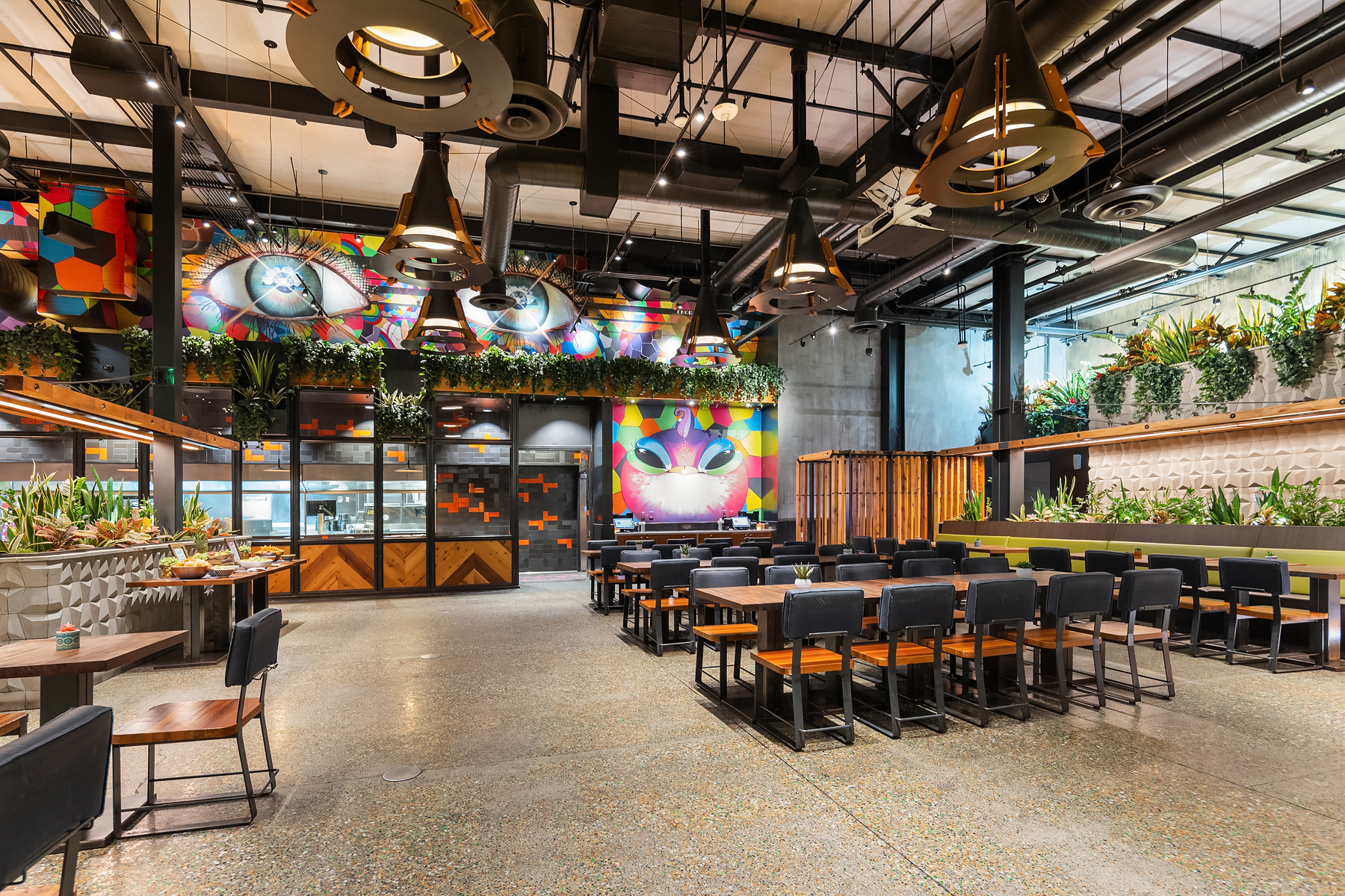 a group of people sitting at a train station