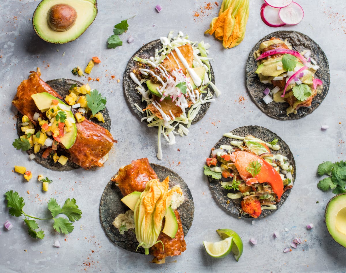 blue tortilla tacos on a table