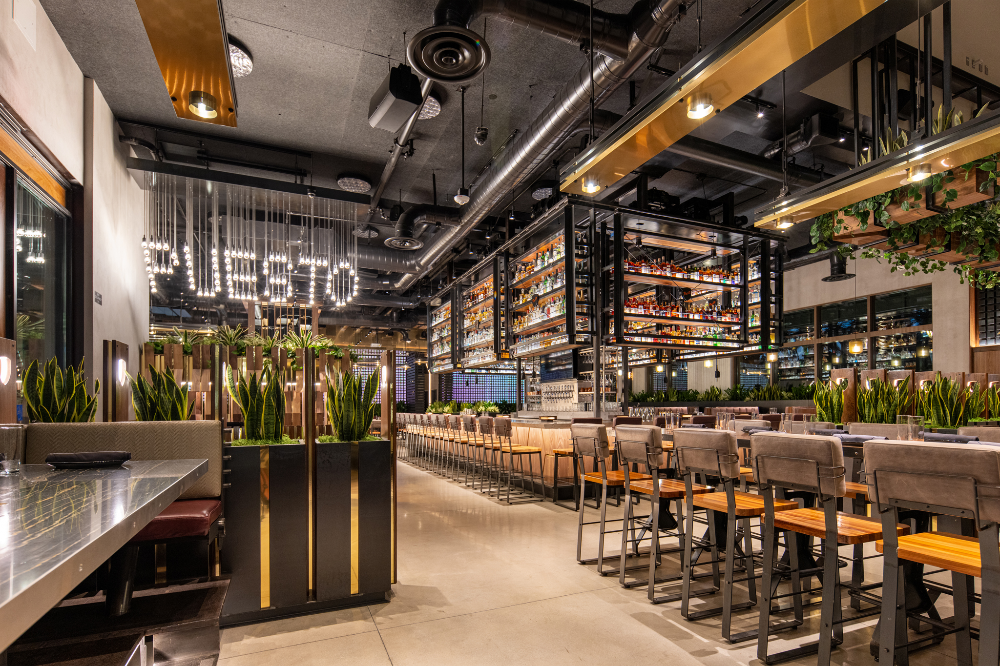 a group of people sitting at a train station
