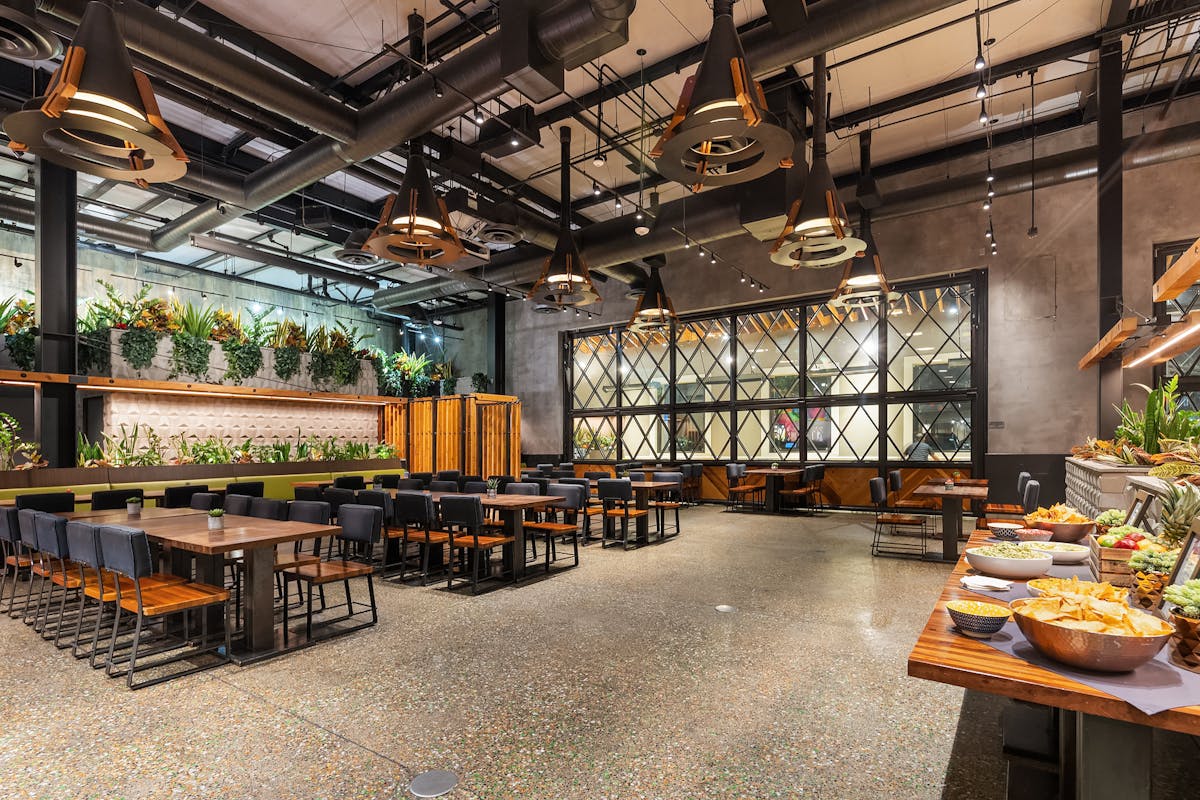 a group of people sitting at a train station