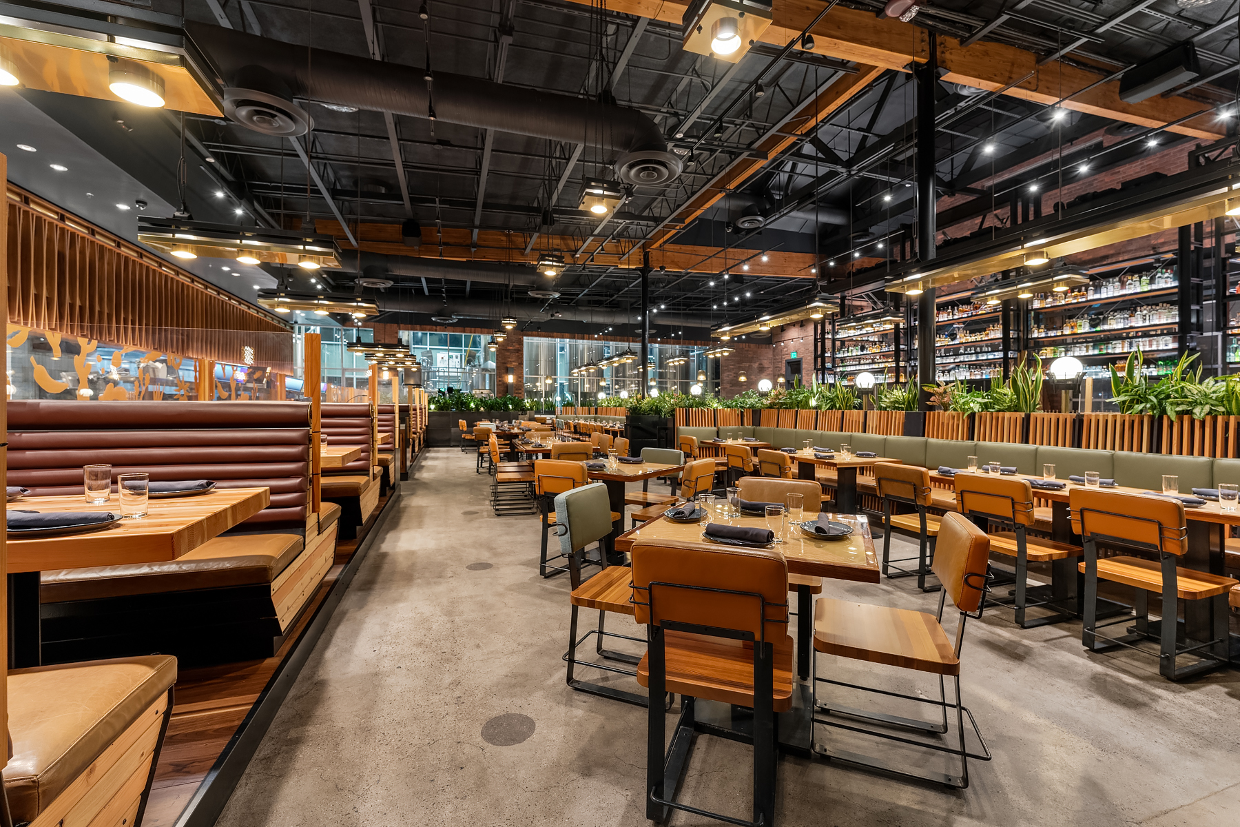 a group of people sitting at a train station