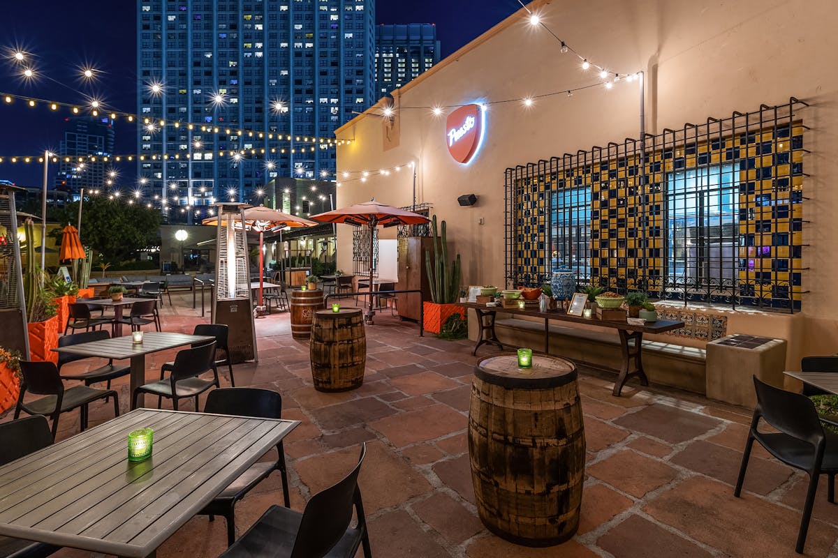 a room filled with furniture and a large building