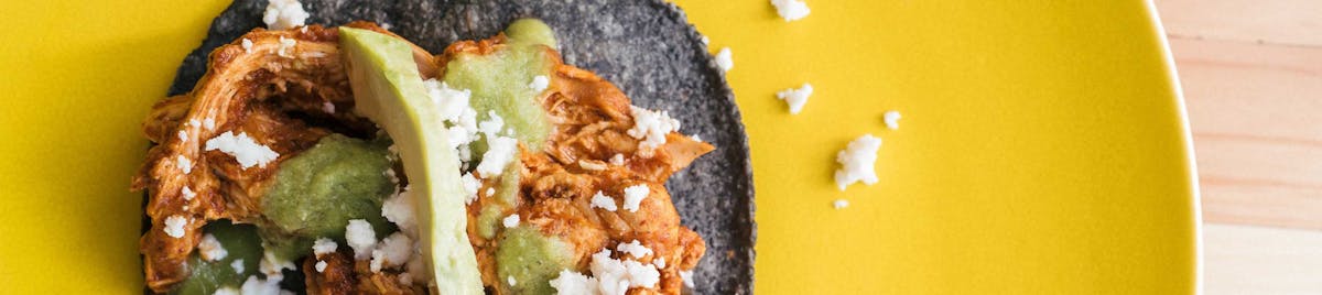 a blue tortilla taco on a plate