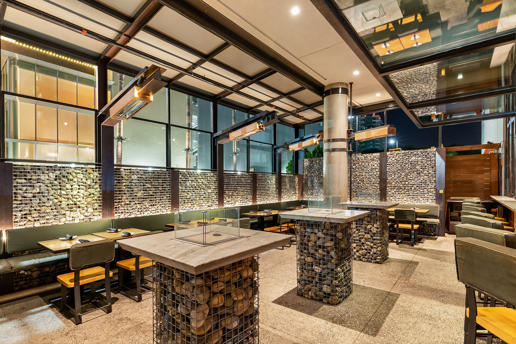 a train is parked on the side of a building