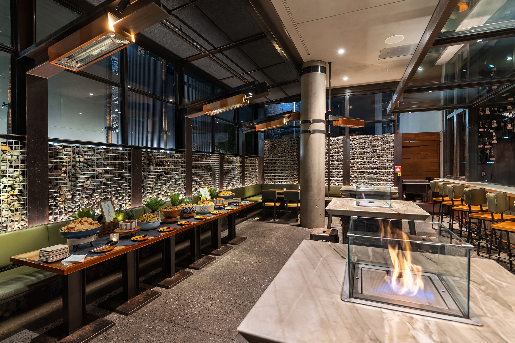 a group of people sitting at a train station