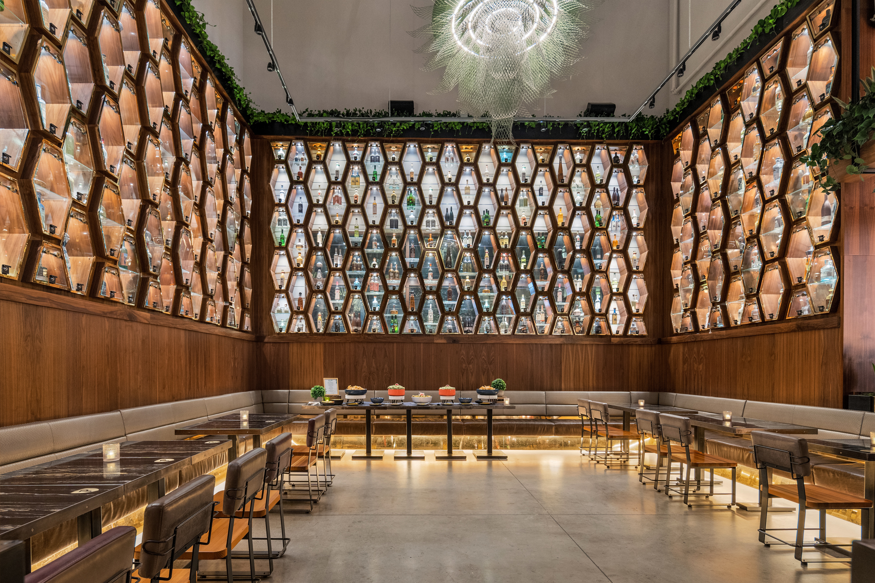 a group of people walking on a wooden bench