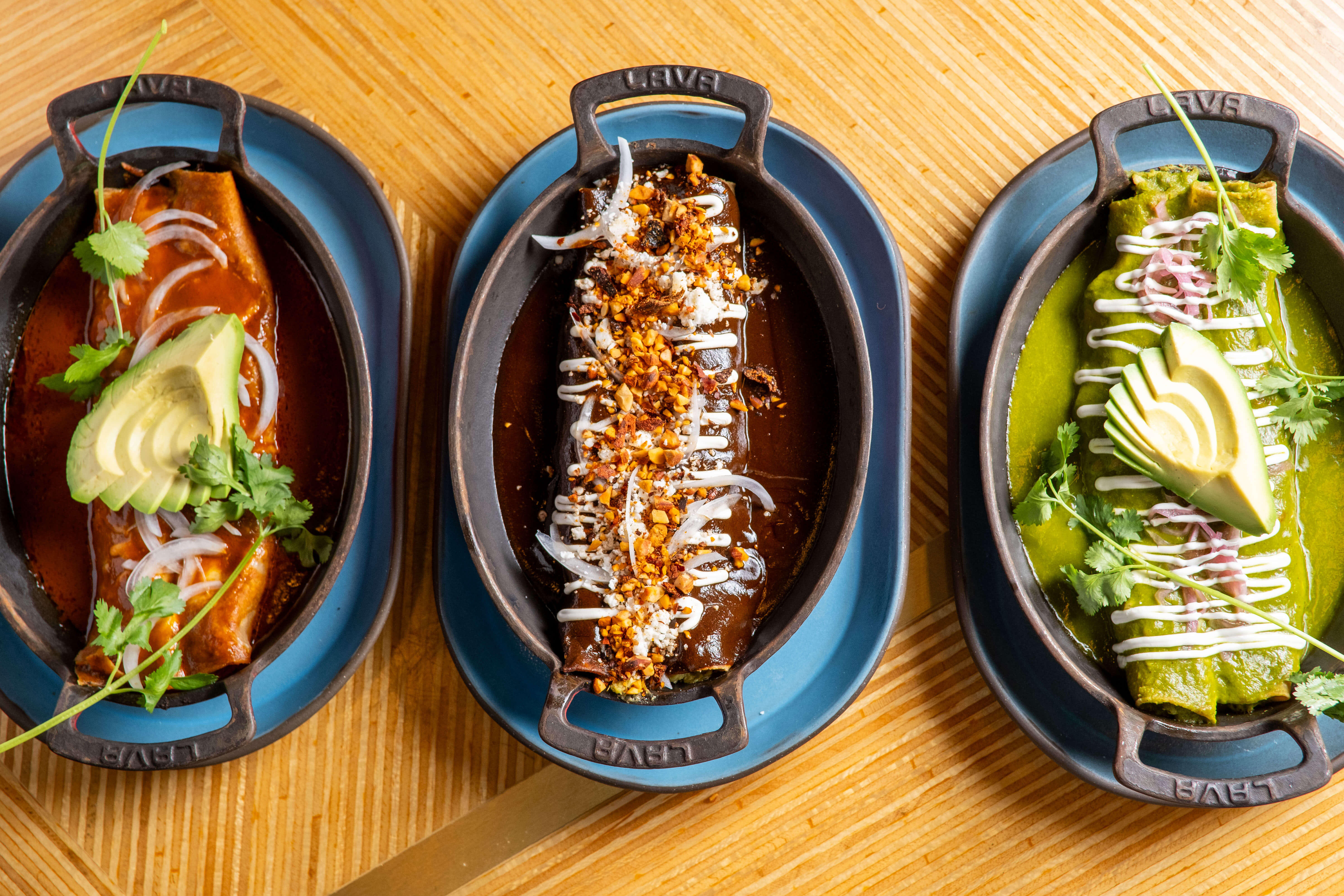 Three new enchiladas at Puesto Mexican restaurant: Chicken mole, enchilada suizas and short rib.