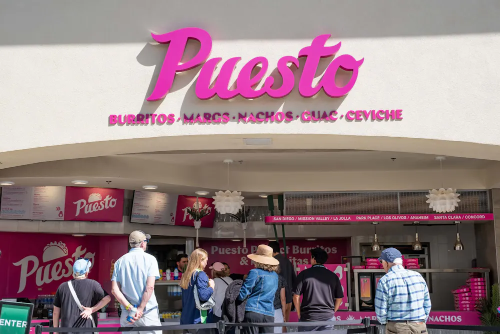 A group of people waiting in a line