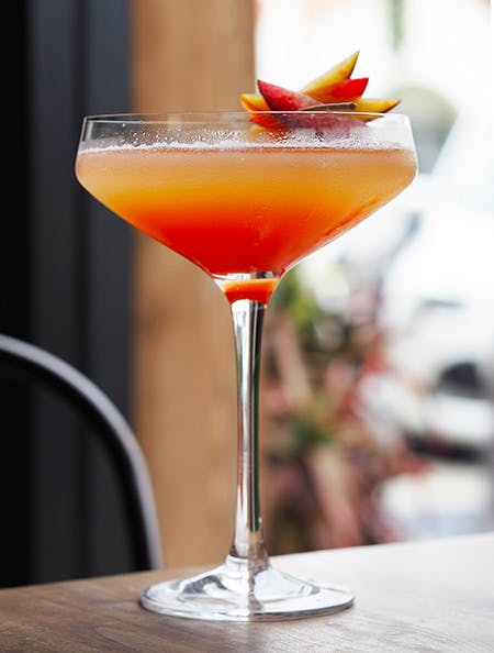 a close up of a drink on a table