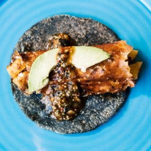 a blue tortilla taco on a table