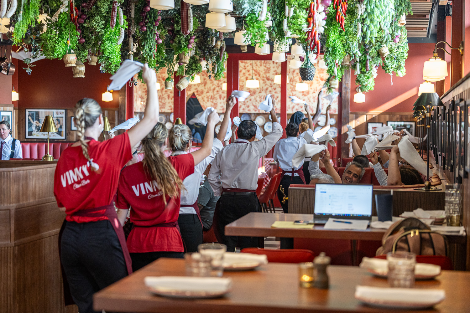 a group of people in a restaurant
