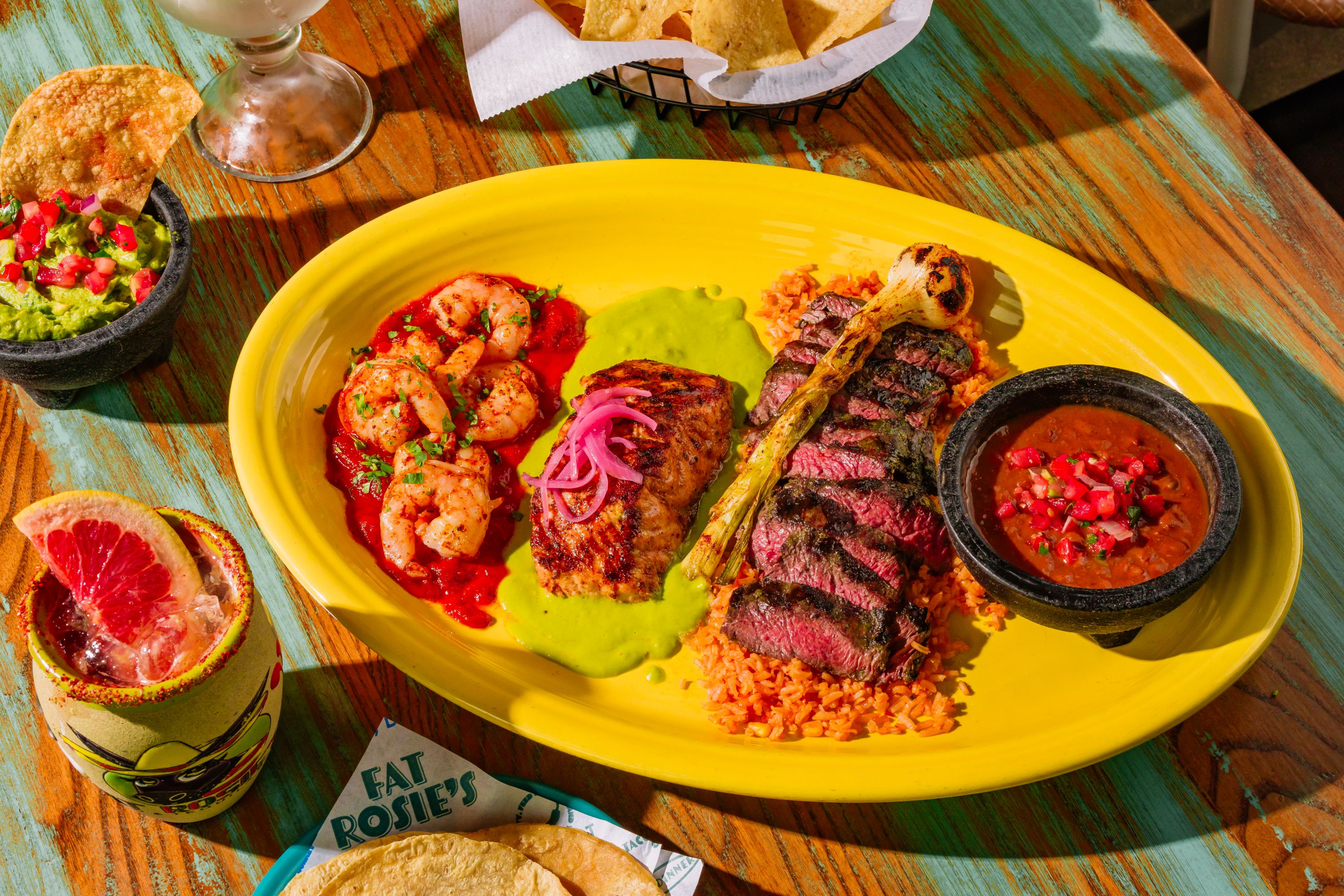 A long table set for a group at Fat Rosie's